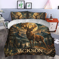 Deer duvet cover set styled in a bedroom with dramatic stag, forest, mountain, and full moon artwork