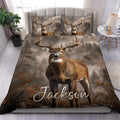 Deer duvet cover set displayed on a bed with matching pillowcases and a misty forest scene