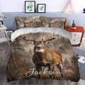 Rustic deer duvet cover set styled in a bedroom with antler artwork and autumn forest scenery