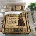Labrador Retriever bedding set displayed in a bright bedroom with sepia artwork, paw prints, and dog motifs