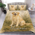 Labrador Retriever duvet cover set displayed on a bed with golden dog artwork and botanical foliage
