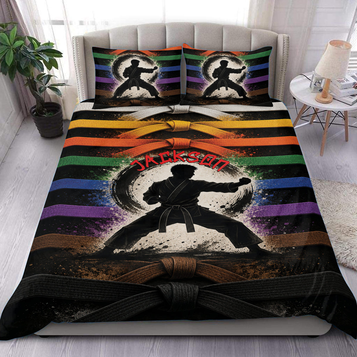 Karate duvet cover set displayed on a bed with colorful belt stripes and martial arts silhouette artwork