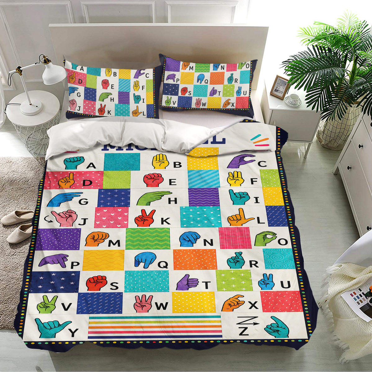 Sign language alphabet duvet cover set shown in a bright bedroom with multicolor hand sign artwork