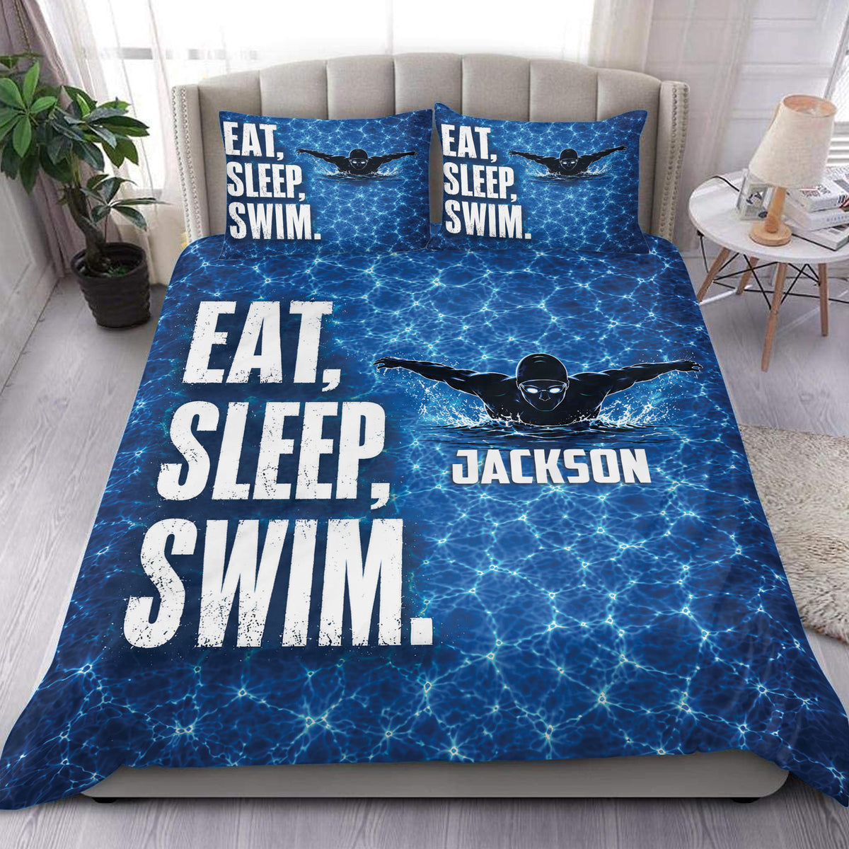 Blue swimming duvet cover set with swimmer artwork, pool water texture, and bold sporty bedroom lettering