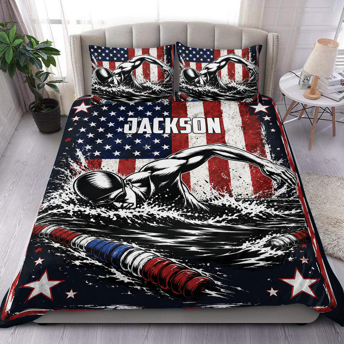 Swimming duvet cover set displayed on a bed with swimmer artwork, patriotic red, white, and blue accents