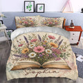 Floral book duvet cover styled in a bright bedroom with botanical wall art and coordinated decor