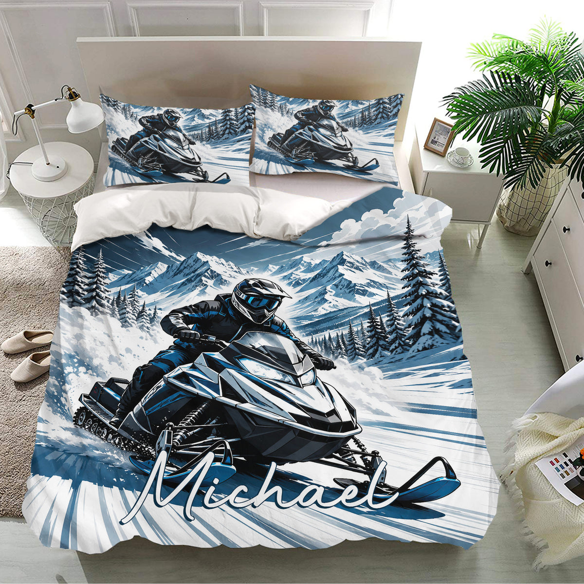 Snowmobile bedding set presented in a bright bedroom with matching pillowcases and bold blue winter mountain artwork