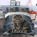 Maine Coon duvet cover bedding set styled in a bedroom with a large cat portrait and snowy forest scene