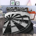 Black and white dart board duvet cover displayed in a stylish bedroom with matching pillows