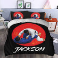 Jiu jitsu duvet cover set styled in a bedroom with bold red and black grappling artwork