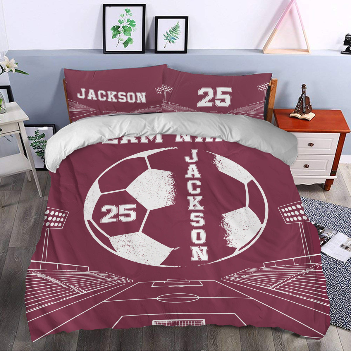Maroon soccer duvet cover set styled in a bedroom with stadium artwork and large soccer ball design