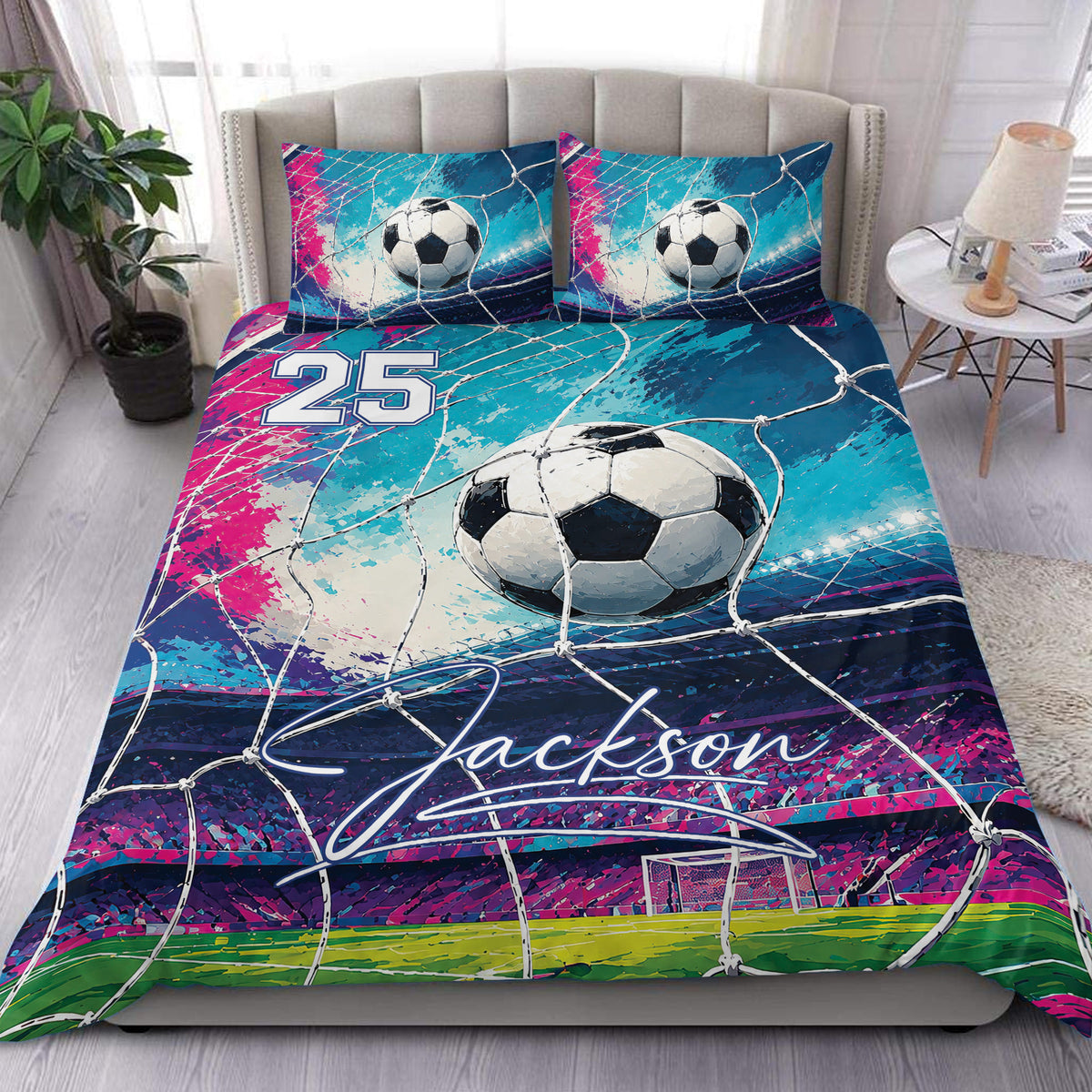 Soccer duvet cover set displayed on a bed with vivid blue, pink, and green ball and goal artwork
