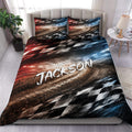 Racing duvet cover set displayed on a modern bed with red, black, white, and blue track artwork