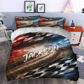 Racing duvet cover styled in a bedroom with dramatic track lighting and checkered flag artwork