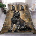Cane Corso duvet cover set displayed on a bed with a bold black dog portrait and bronze textured artwork