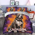 Pitbull duvet cover styled in a bedroom with a large dog portrait and colorful artistic background
