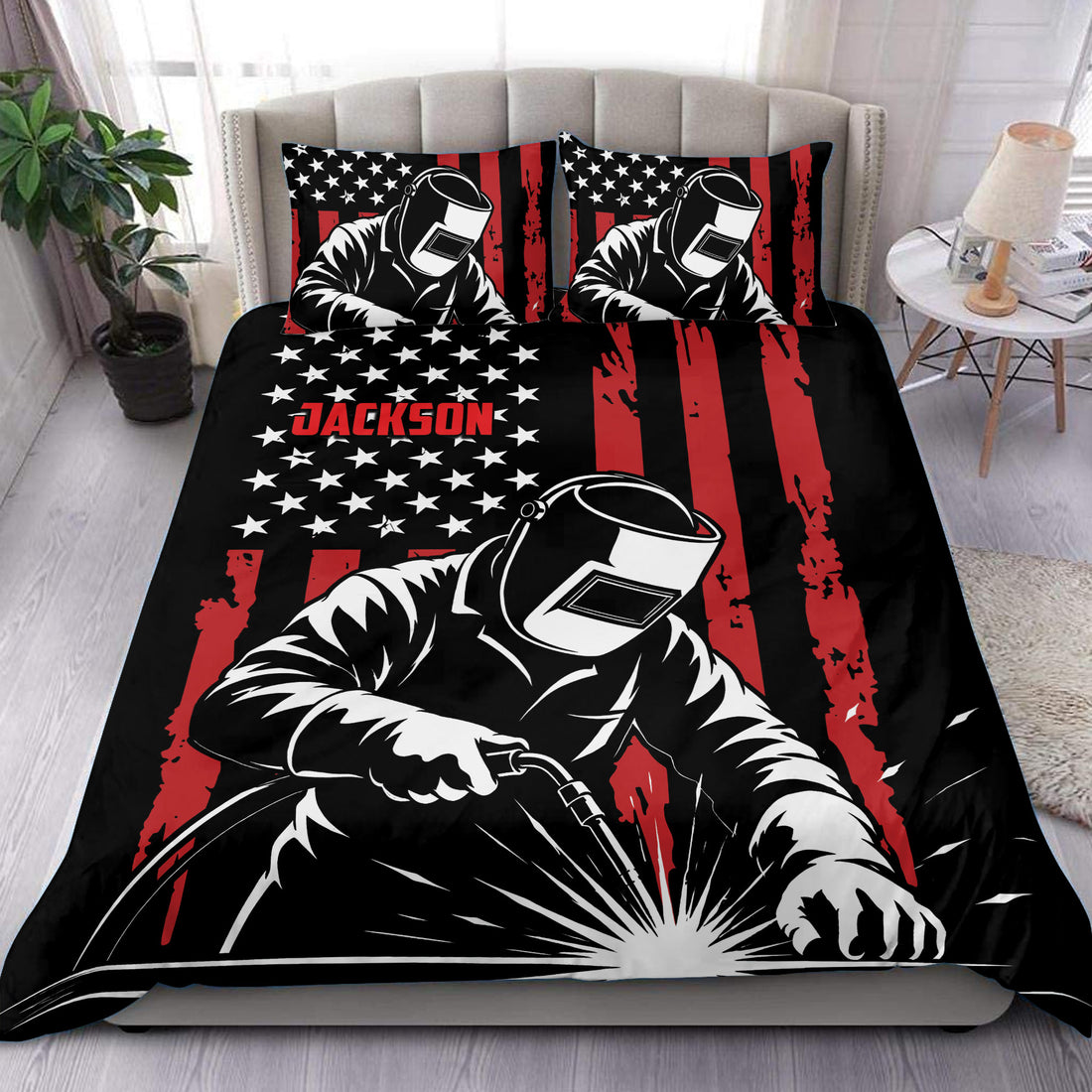 Welder duvet cover set in black, red, and white with bold stars and welding artwork styled on a bedroom