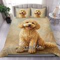 Goldendoodle duvet cover set displayed on a bed with golden curly dog artwork and matching pillowcases