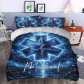 Blue paramedic duvet cover styled in a bedroom with bold Star of Life design and matching pillowcases