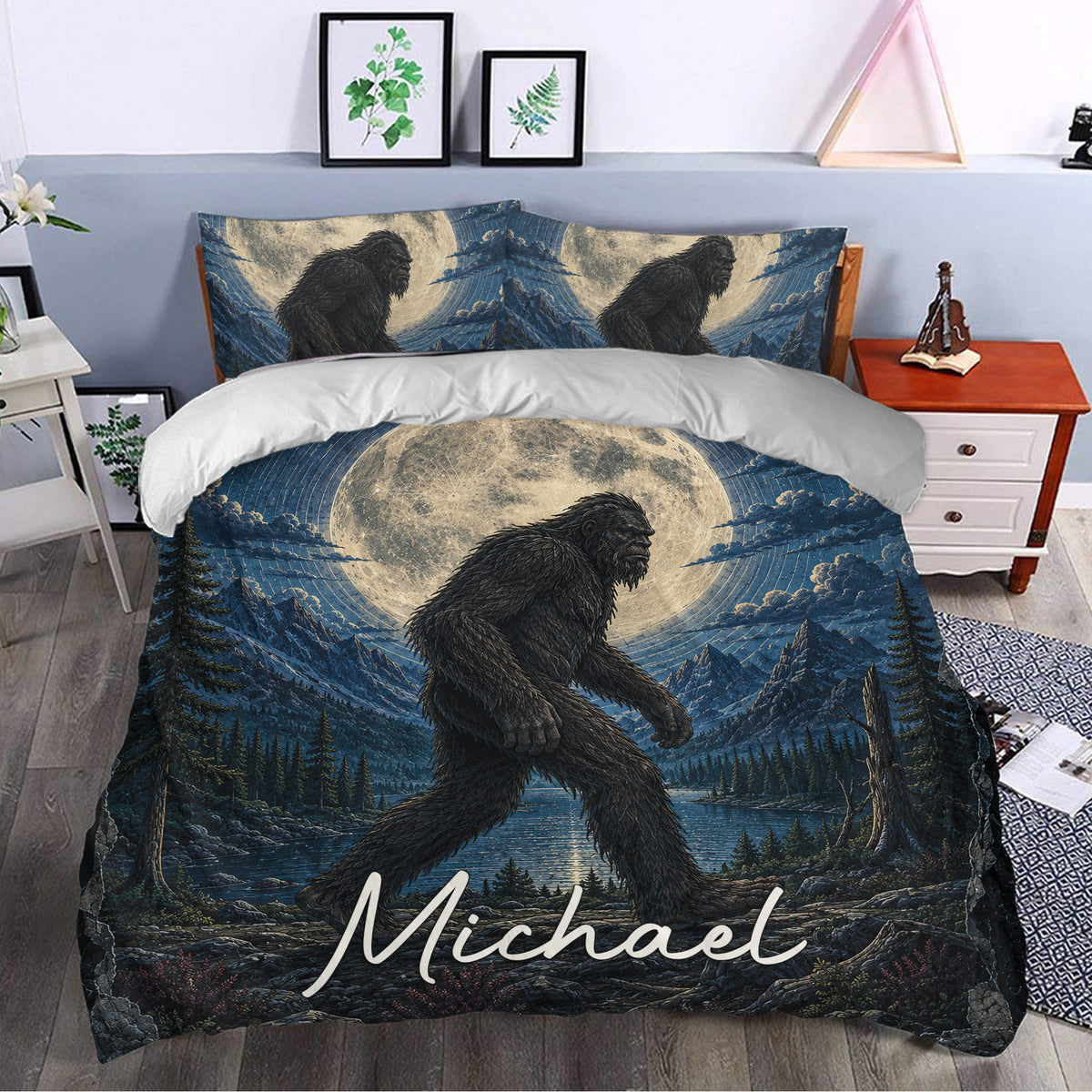 Bigfoot duvet cover styled in a bedroom with moonlit mountains, pine trees, and a lake scene