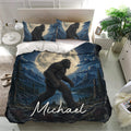 Bigfoot bedding set presented in a bright bedroom with matching blue forest landscape artwork