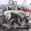 Bigfoot duvet cover styled in a bedroom with dramatic grayscale mountain and forest scenery