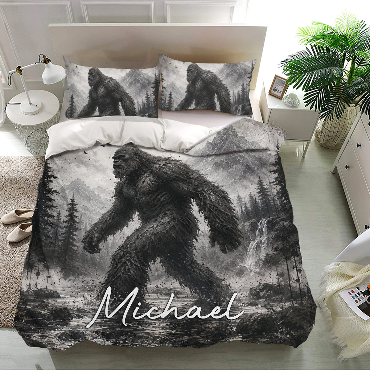 Bigfoot bedding set displayed in a bright bedroom with matching grayscale mountain artwork