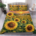 Sunflower duvet cover set displayed on a bed with bright yellow blooms and sunset field artwork