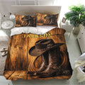 Western cowboy bedding set presented in a bright bedroom with boot and cowboy hat artwork on rustic wood texture