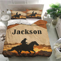 Western duvet cover bedding set styled in a bright bedroom with cowboy horse artwork