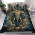 Elephant duvet cover set displayed on a bed with ornate blue and gold artwork and matching pillowcases