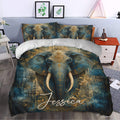 Ornate blue and gold elephant duvet cover styled in a modern bedroom with matching pillowcases