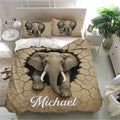 Elephant duvet cover set displayed in a bright bedroom with matching pillowcases and dramatic cracked earth design