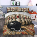 Bowling duvet cover set styled in a bedroom with bold pin artwork, black ball details, and red accents