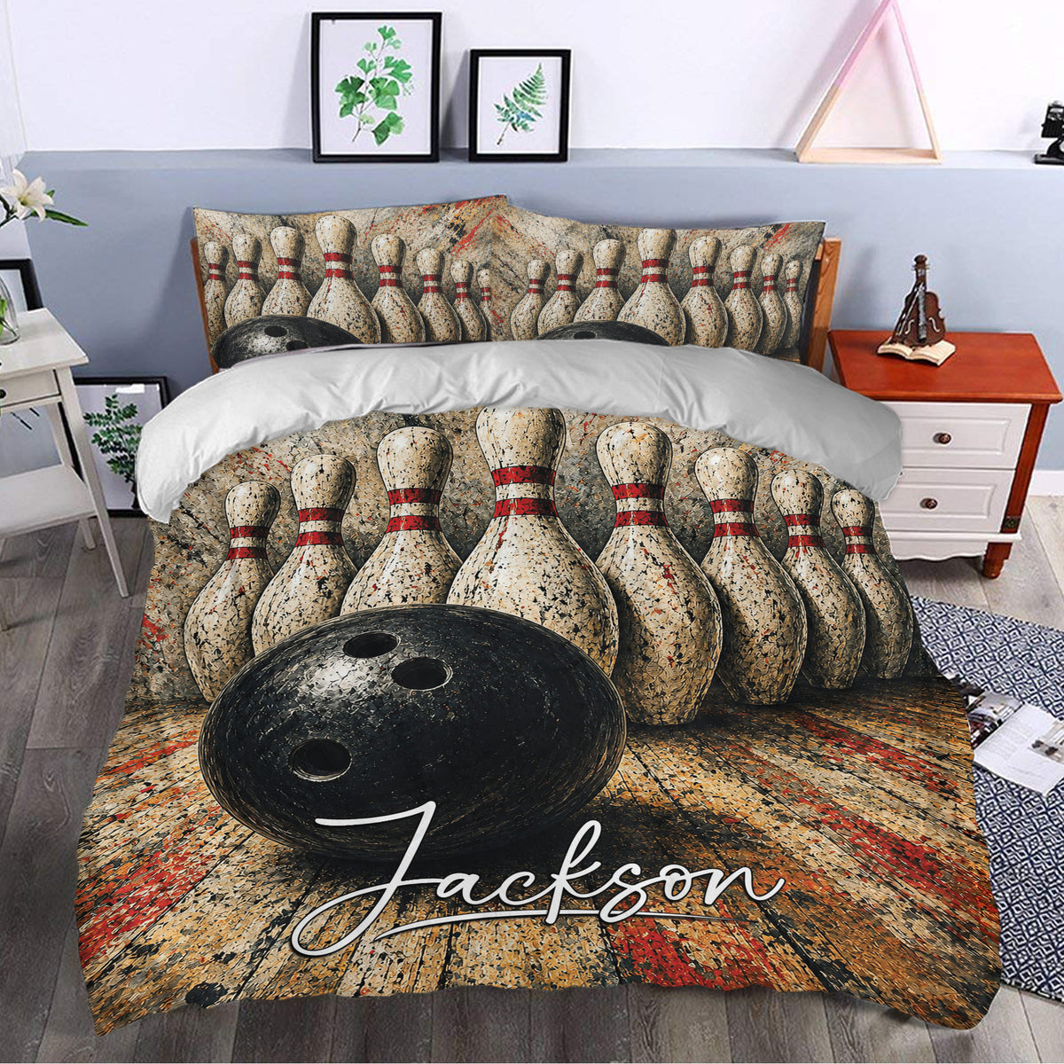 Bowling duvet cover set styled in a bedroom with bold pin artwork, black ball details, and red accents