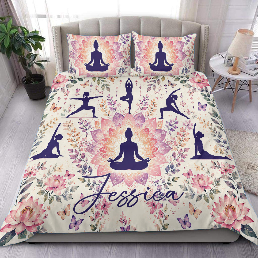 Yoga duvet cover set on a bed with meditation silhouettes, lotus flowers, butterflies, and floral artwork