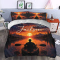 Kayak bedding set styled in a bedroom with orange sunset mountains, trees, and a paddler