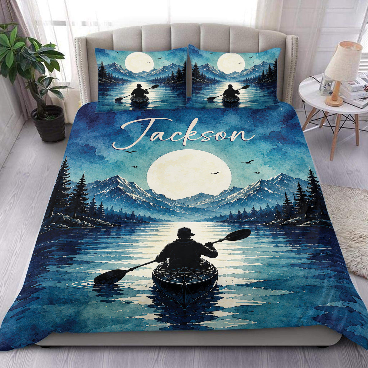 Blue kayak duvet cover bedding set with moonlit mountain lake artwork displayed on a bedroom bed