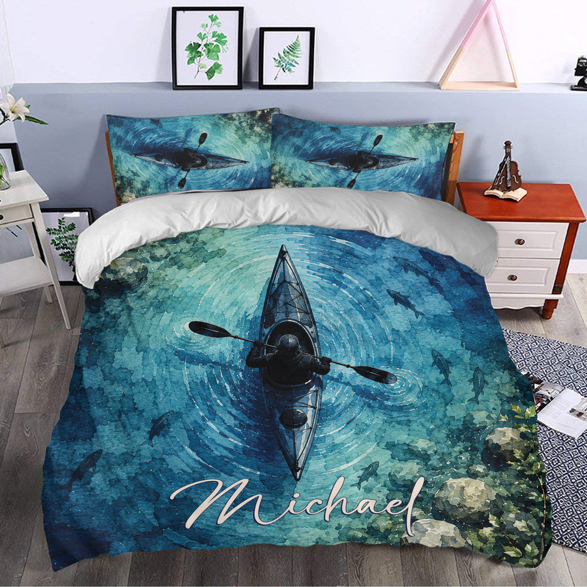 Kayak duvet cover styled in a bedroom with blue water, fish, and nature-inspired watercolor artwork