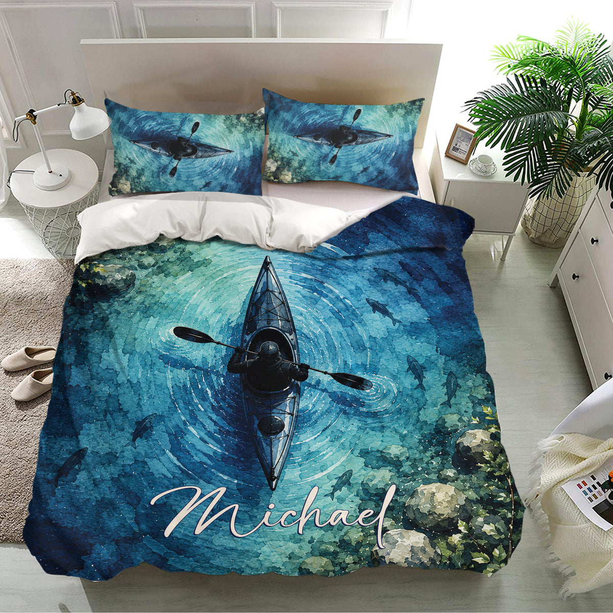 Blue kayak bedding set displayed in a bright bedroom with matching pillows and aquatic watercolor scenery