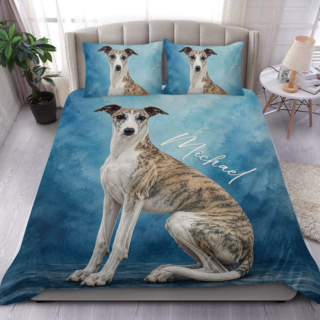 Whippet duvet cover set displayed on a bed with blue watercolor artwork and Custom lettering