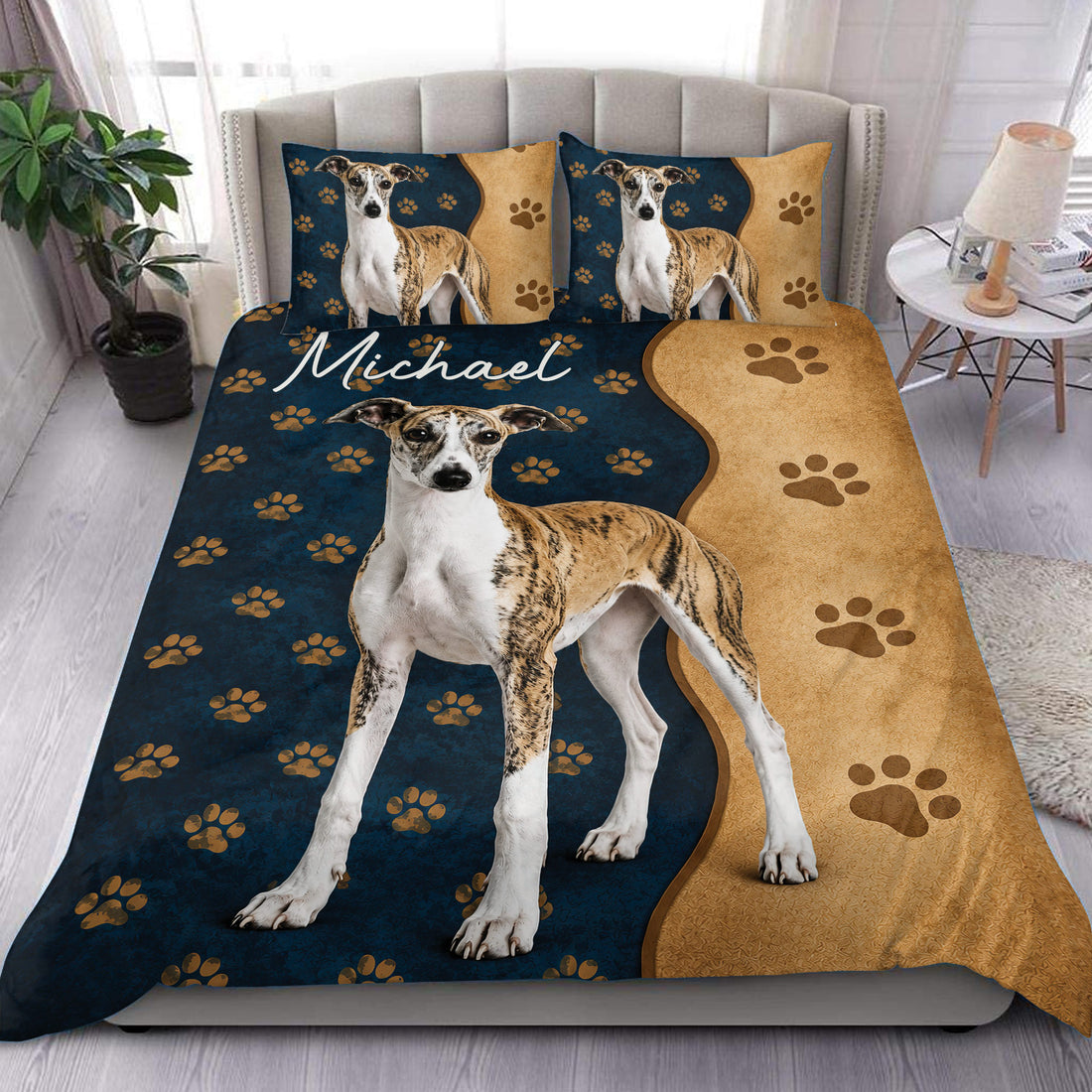 Whippet duvet cover set displayed on a bed with navy and tan paw print artwork