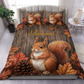 Squirrel duvet cover set displayed on a bed with autumn leaves, pinecones, and rustic woodgrain artwork