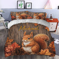 Rustic squirrel duvet cover set styled in a bedroom with autumn leaves and woodland artwork