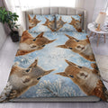 Squirrel duvet cover set displayed on a bed with snowy branches and blue woodland artwork