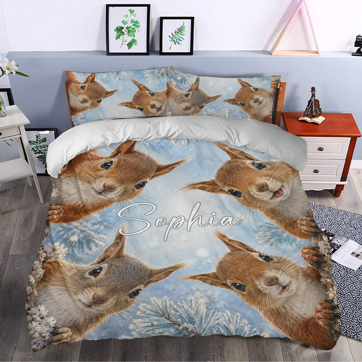 Squirrel duvet cover bedding set styled in a bedroom with snowy woodland artwork and blue tones