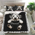 Black Dalmatian duvet cover bedding set styled in a bright bedroom with spotted trim and matching pillowcases