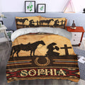 Cowgirl duvet cover styled in a bedroom with horse, prayerful cowgirl, cross, horseshoe, and western patterns
