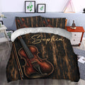 Rustic violin duvet cover styled in a bedroom with matching pillows and dramatic black and copper artwork