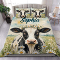 Dairy cow duvet cover set with daisy flower crown artwork displayed on a modern bedroom